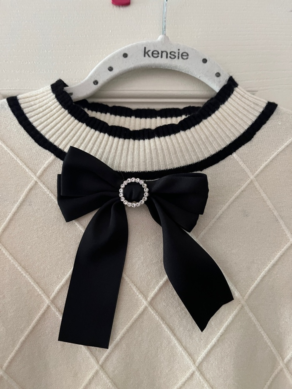 Ontwelth Cream Short sleeve Sweater with Black Trim and Black Bow Accent - Picture 2 of 5